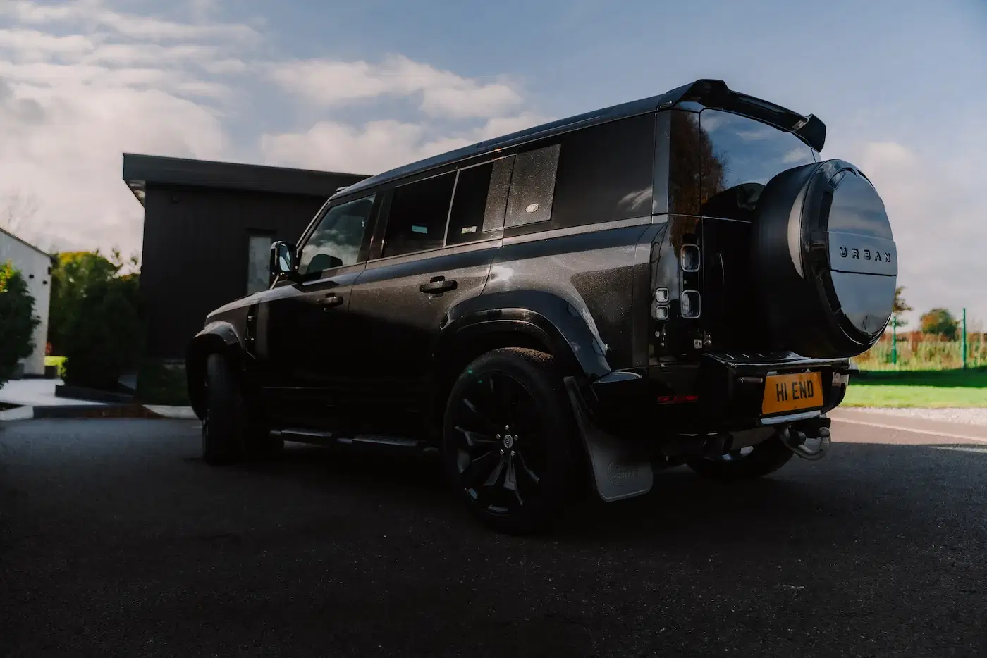 Rear of Land Rover Defender 110 available for self-drive hire and chauffeur driven hire in London