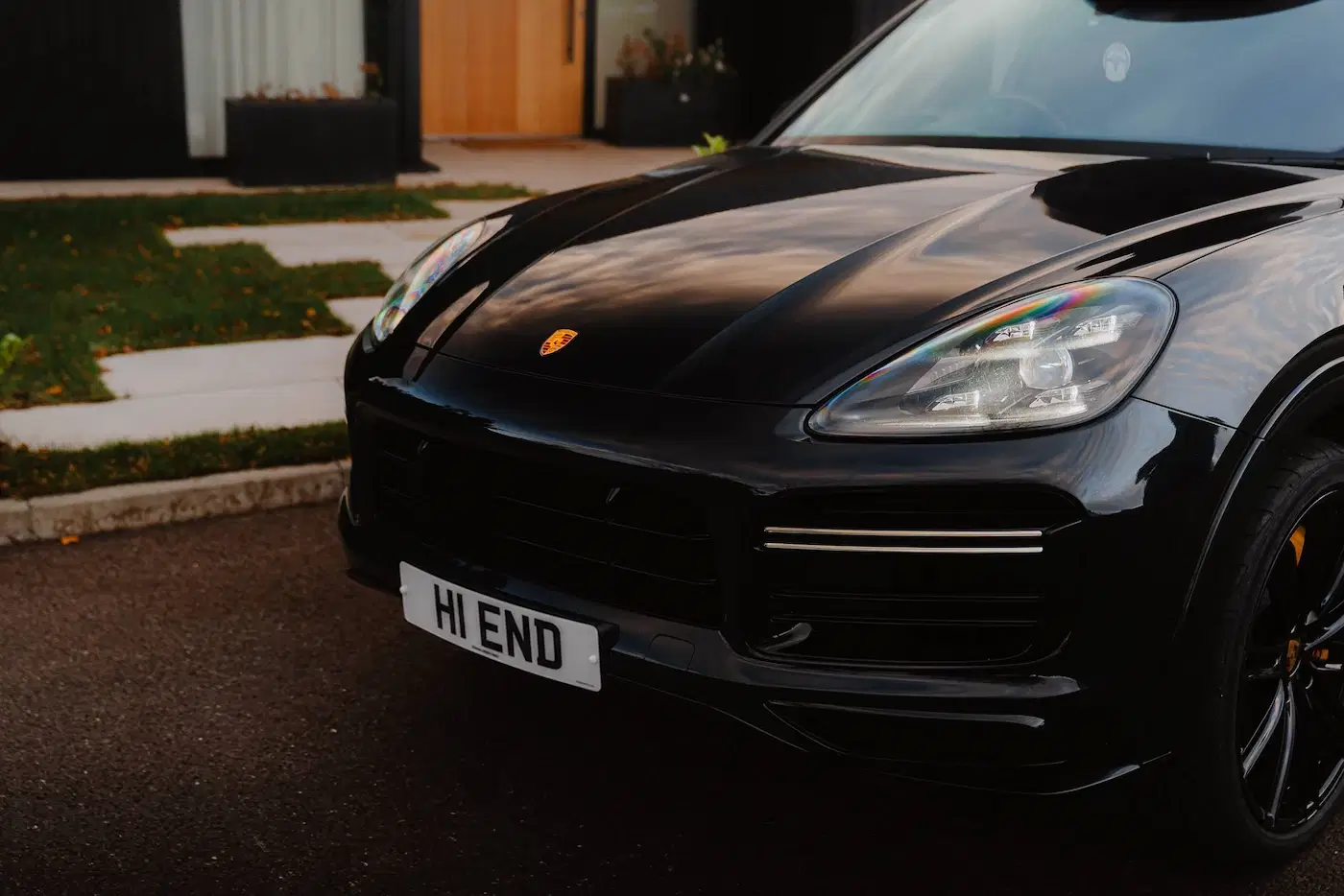 Close up of front of Porsche Cayenne Turbo S Hybrid with roof rack and storage, available for self-drive hire and chauffeur driven hire in London