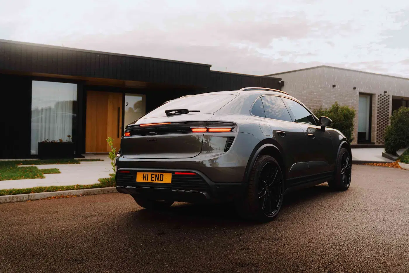Rear of Porsche Macan Turbo EV available for self-drive hire and chauffeur driven hire in London