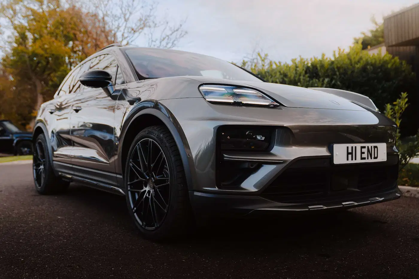 Front of Porsche Macan Turbo EV available for self-drive hire and chauffeur driven hire in the UK