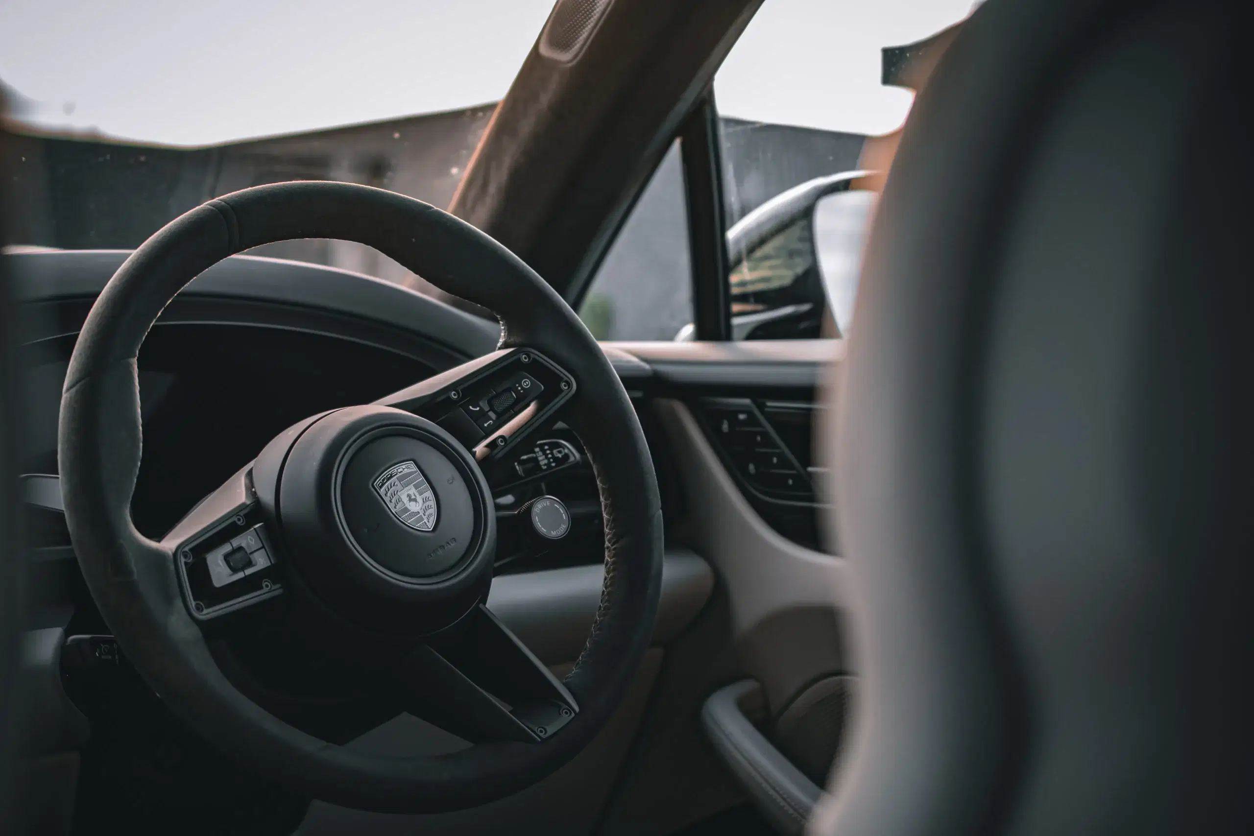Luxury car interior with steering wheel