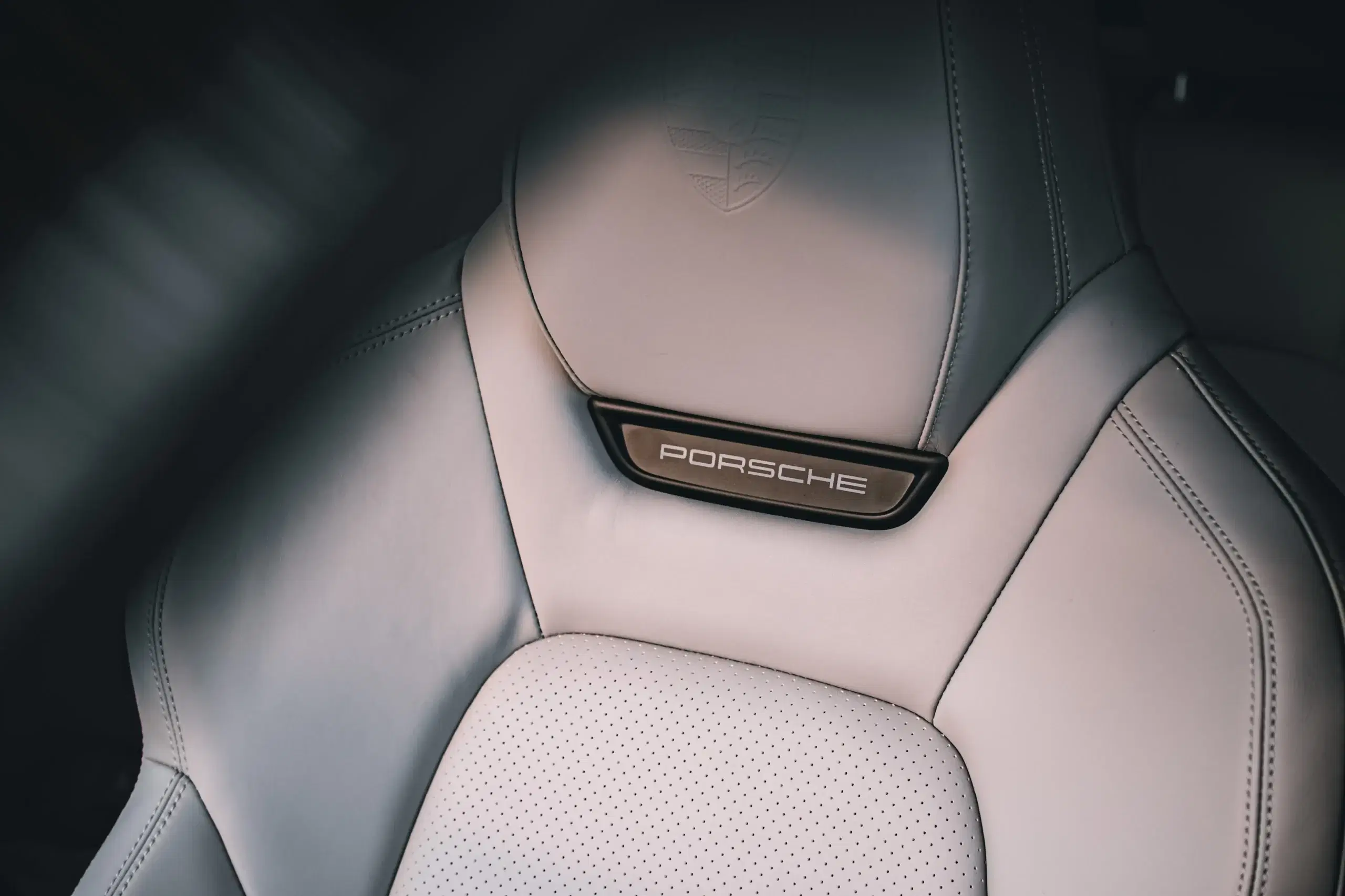 Luxury car seat with Porsche branding