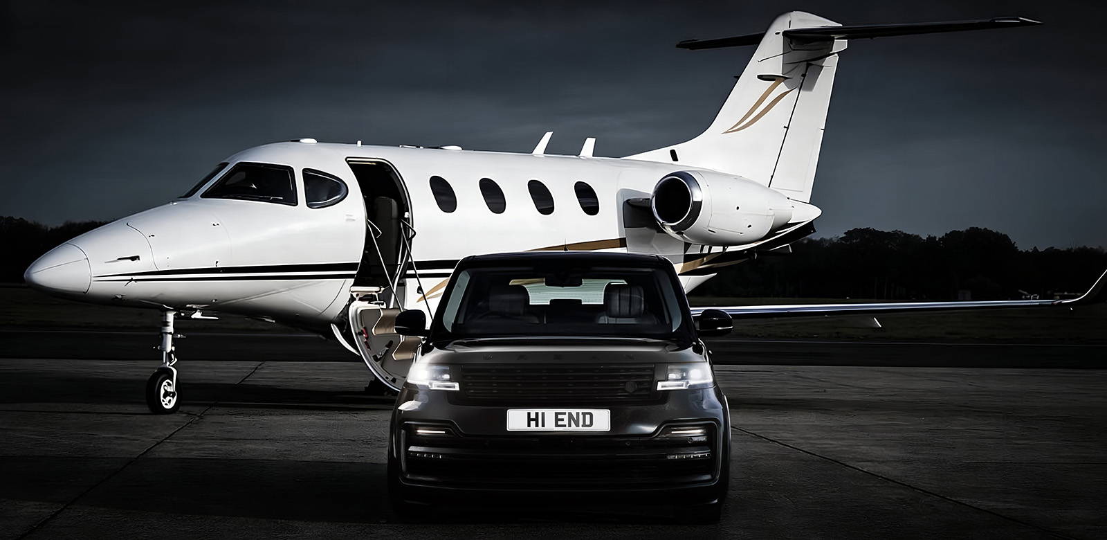 Luxury jet and high-end vehicle.